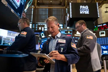 Falling oil prices help calm both stock, bond markets